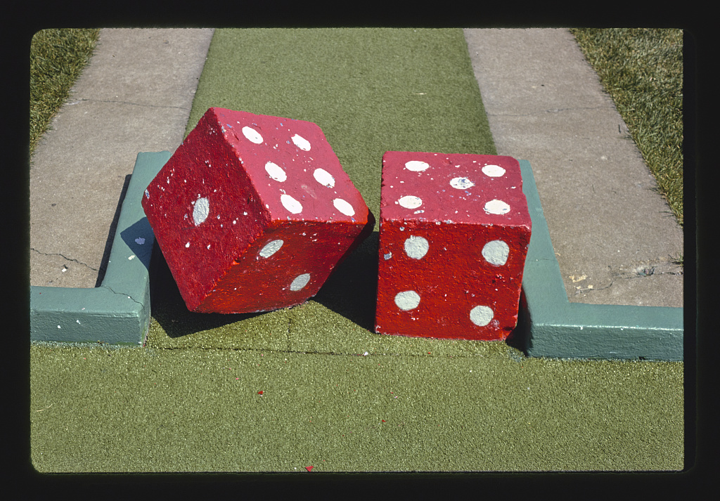 Large Dice on green grass in Roseville, Michigan